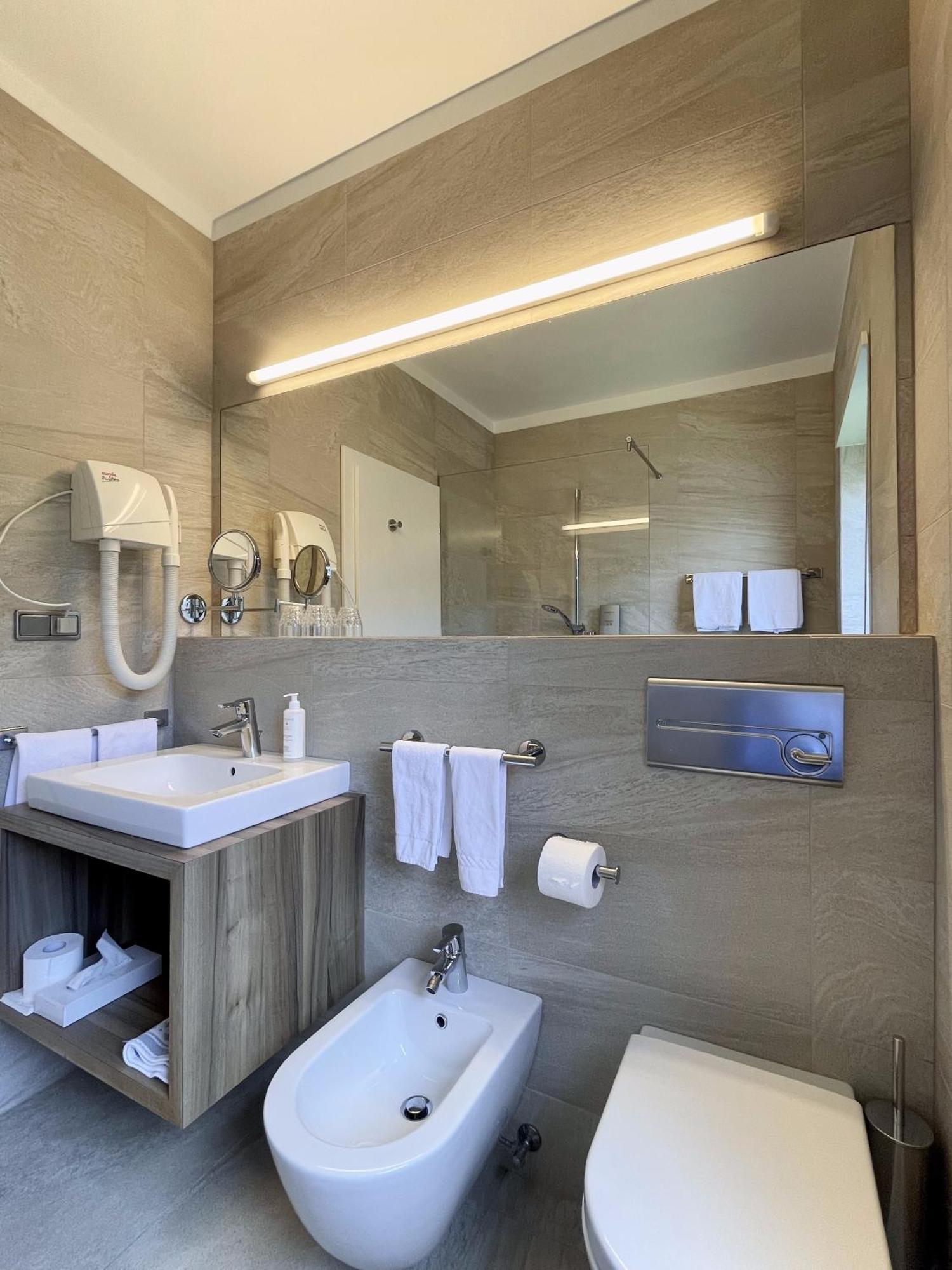 Hotel Am Wolfgrubenersee โซปราบอลซาโน ภายนอก รูปภาพ